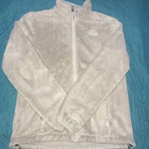 Tan zip up north face jacket